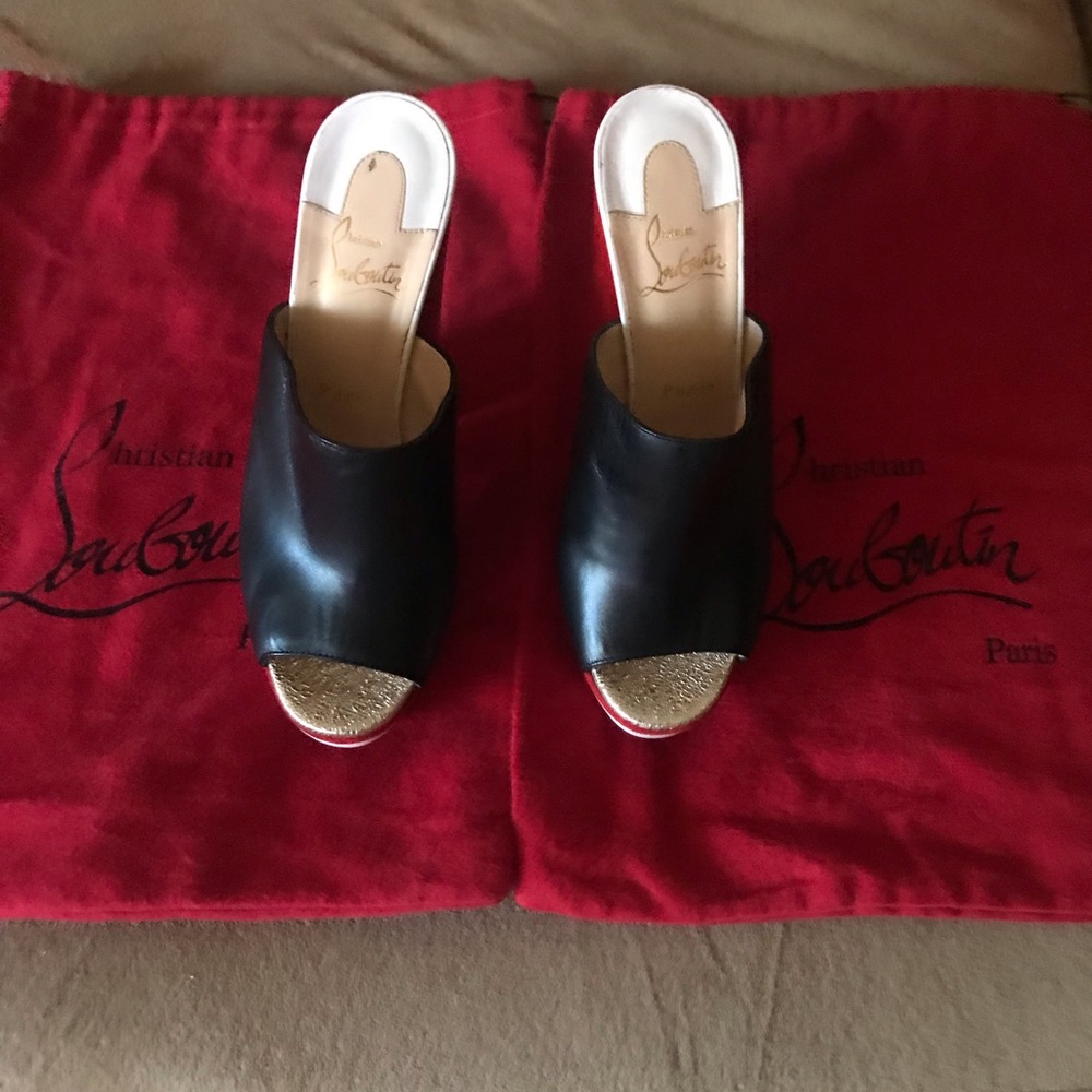 Black and red Christian Louboutins.